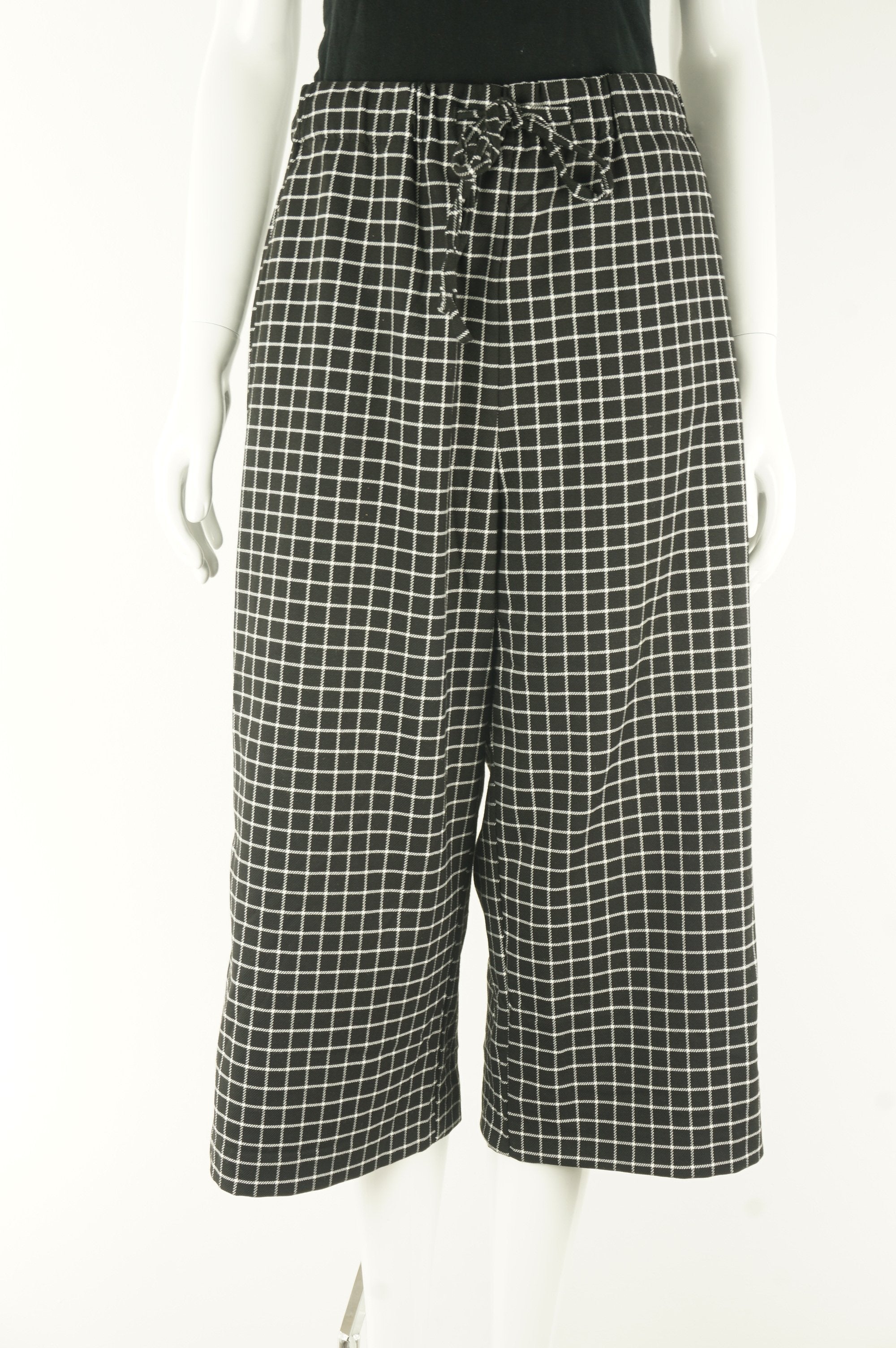 Monki Checked Wide Leg Pants With Elastic Waistband, High waisted wide legged pants are my new favorite! Why? For the exact moment after dinner when you feel overly stuffed but the pants are expandable and hides the food baby…, Black, White, 67% Polyester, 32% Viscose, 1% Elastane, women's Pants, women's Black, White Pants, Monki women's Pants, Women's wide legged checker  capri pants, women's loose fitting checker capri trousers