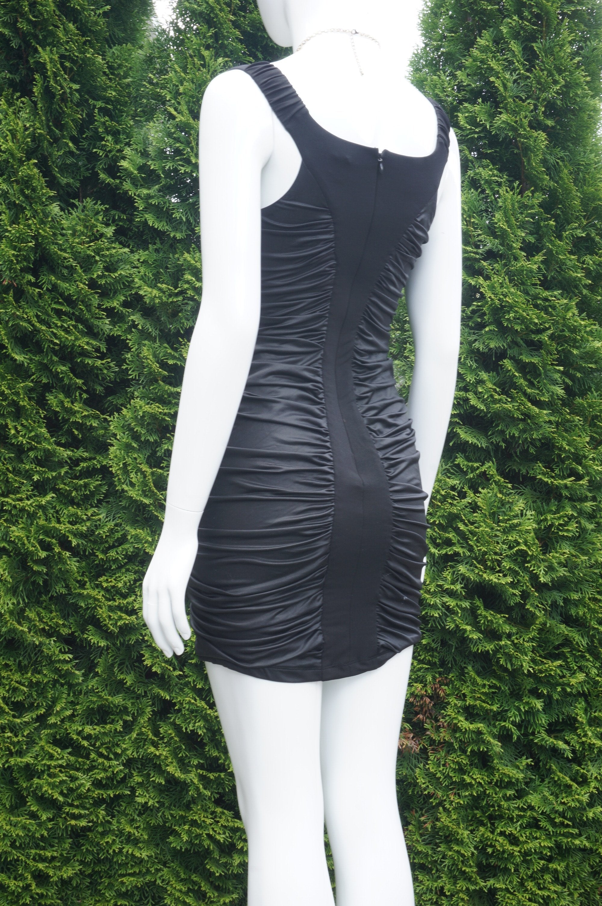 Bebe Sleeveless Stretchy Black Mini Dress, Very Stretchy Dress. Bust 30 inches, waist 26 inches, length 30 inches., Black, 94% Polyester, 6% Spandex. Lining: 100% Polyester, women's Dresses & Rompers, women's Black Dresses & Rompers, Bebe women's Dresses & Rompers, mini dress, bodycon dress, black mini dress