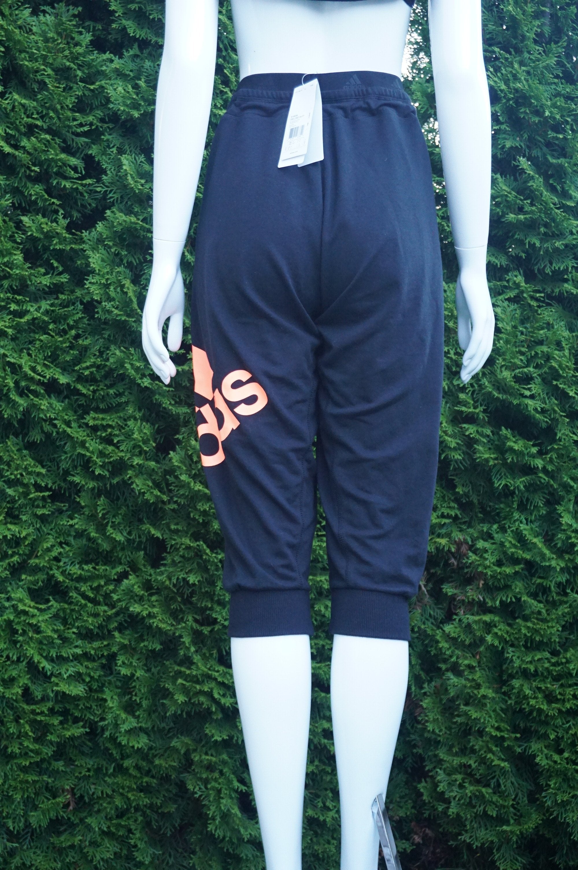 Adidas Comfy Sweatpants, New with tags sweatpants. Waist 31 inches when elastic is relaxed. Length 29.5 inches. Adjustable waist strap, Black, Orange, women's Pants, women's Black, Orange Pants, Adidas women's Pants, sweatpants. Comfy pants, stay at home pants